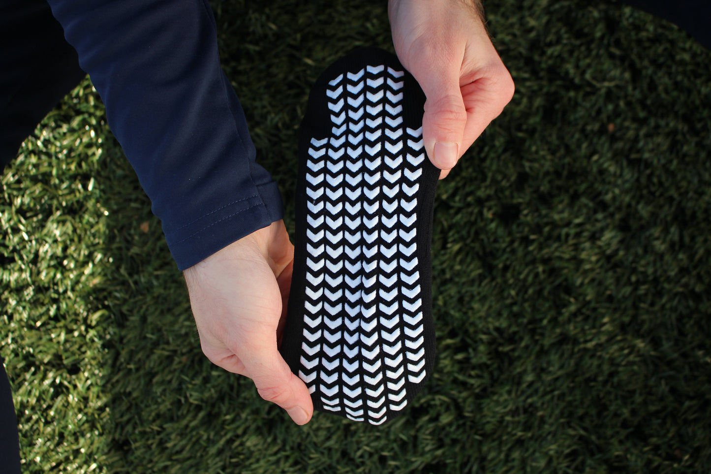 Elevate Grip Socks - Black with white grips.