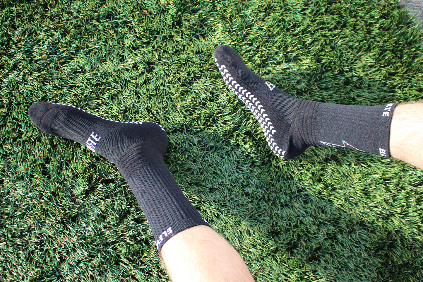 Elevate Grip Socks - Black with white grips.